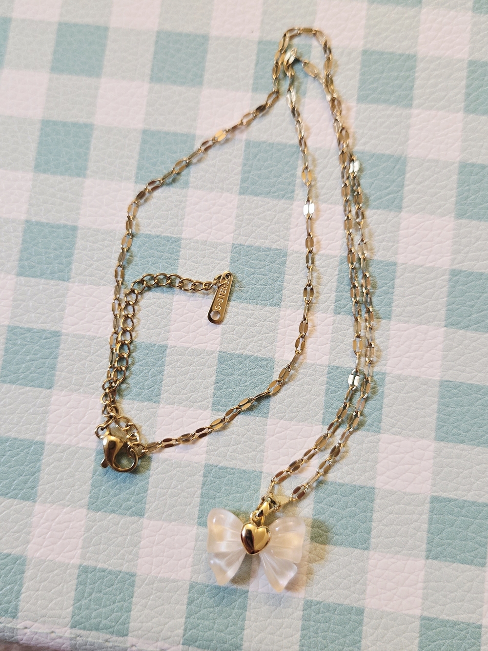 Gold-Tone Necklace with Bow Pendant